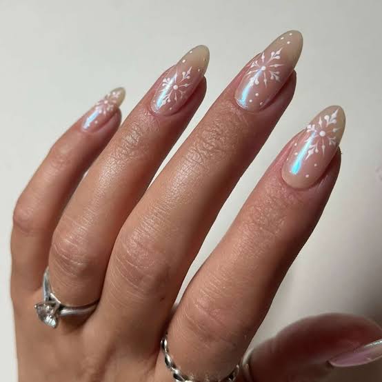 Medium Almond Nails With Milky Shimmer And Snowflakes Medium Almond Nails With Milky Shimmer And Snowflakes — White Christmas Nails