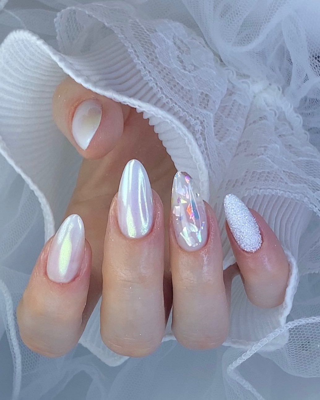 Pearlescent White Chrome Medium Almond Nails Pearlescent White Chrome Medium Almond Nails — White Christmas Nails