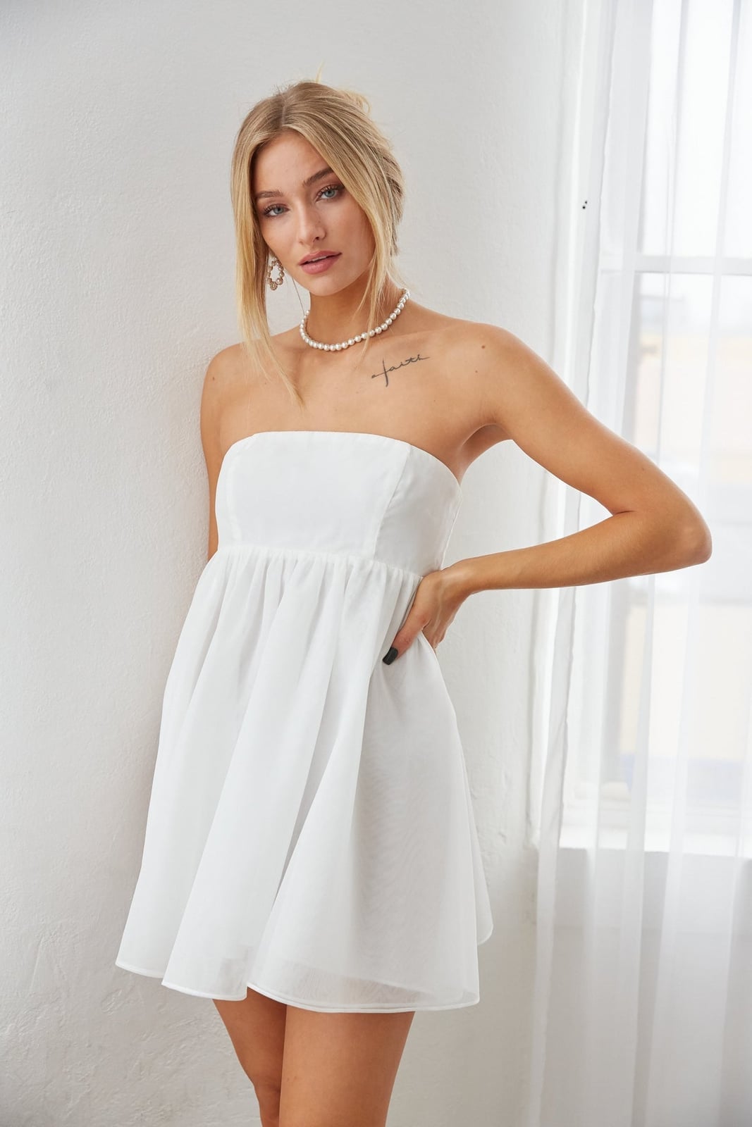 White Strapless Babydoll Mini Dress With Sheer Overlay White Strapless Babydoll Mini Dress With Sheer Overlay — White Dresses Outfit