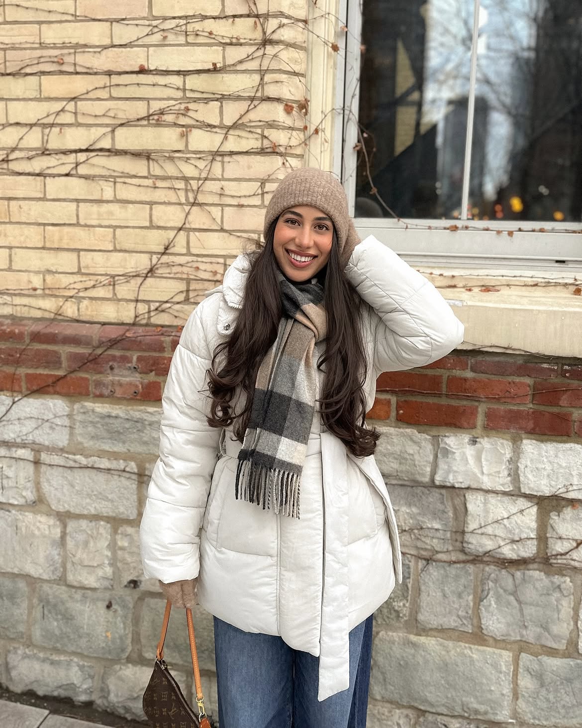 White Puffer Jacket With Plaid Scarf And Beanie
