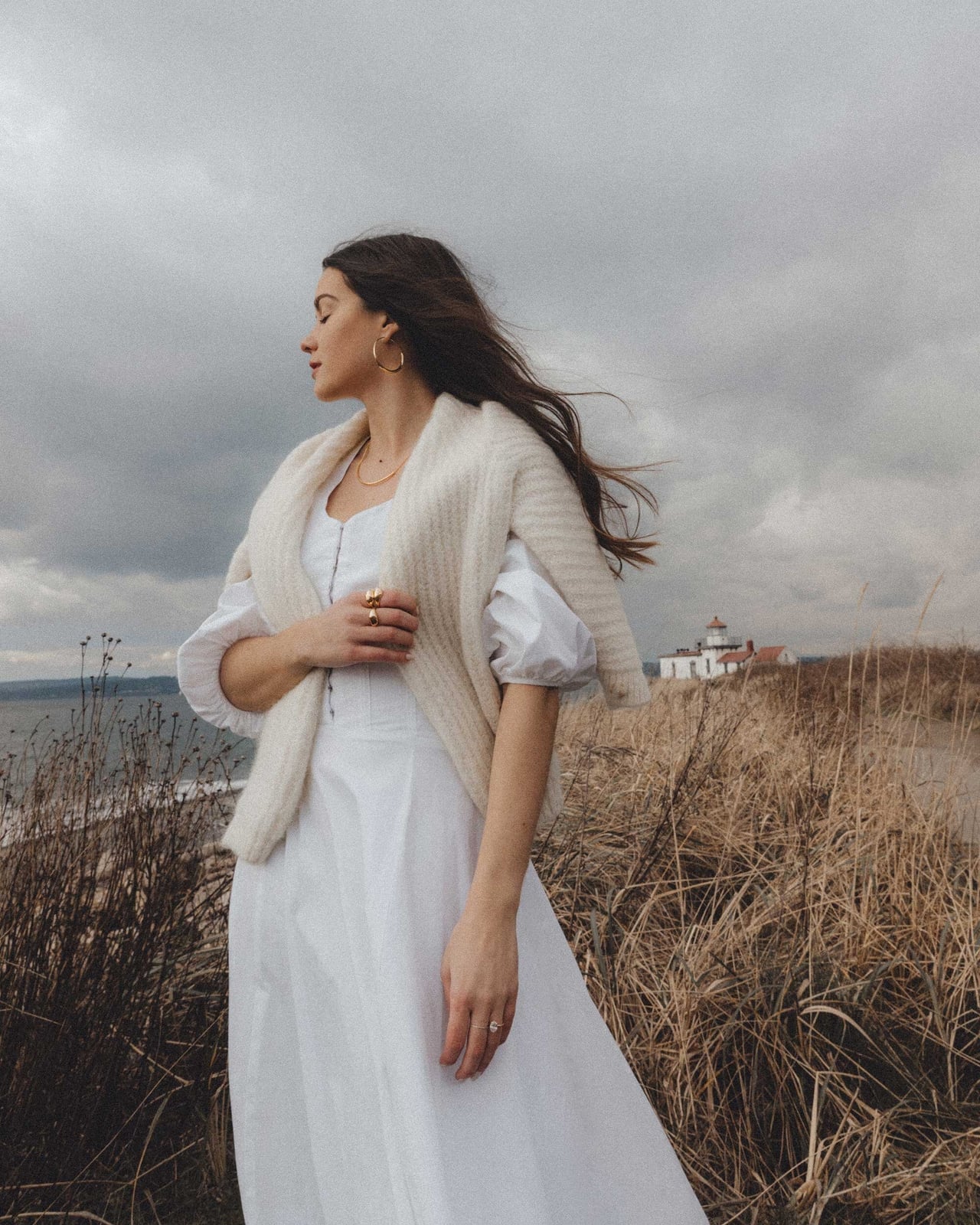 White Dress with Cream Cardigan Draped Over Shoulders — White Sweater Outfit