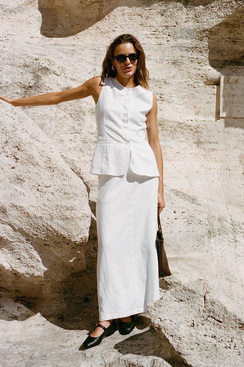 White Peplum Vest with A-line Skirt and Black Ballet Flats White Peplum Vest with A-line Skirt and Black Ballet Flats — White Vest Outfit
