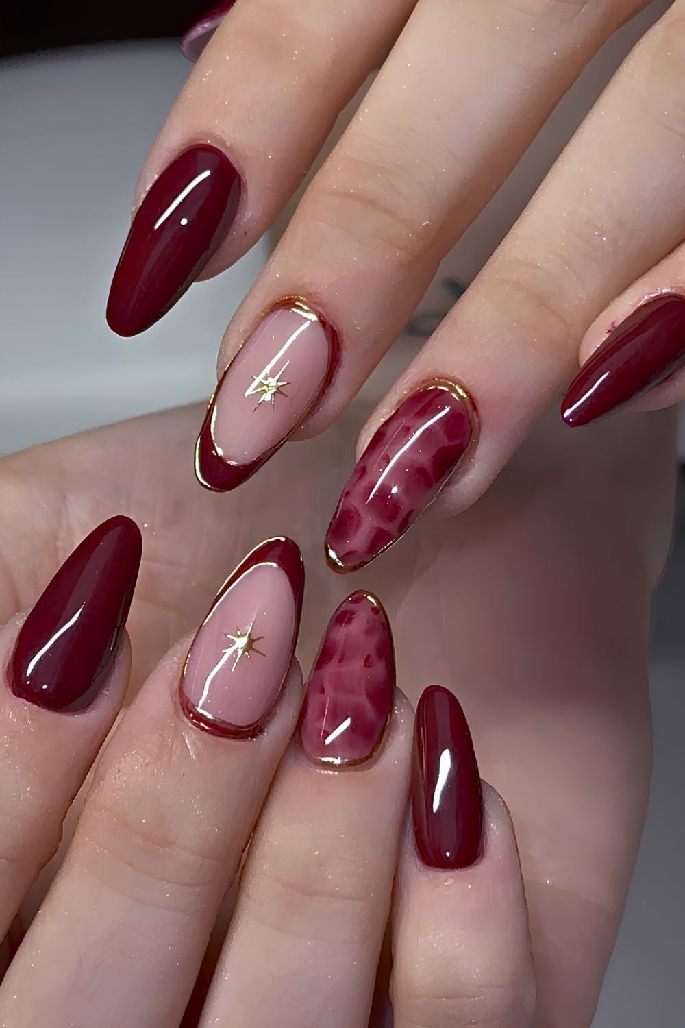Burgundy Almond Nails with Gold Accents Burgundy Almond Nails with Gold Accents — Wine Nails