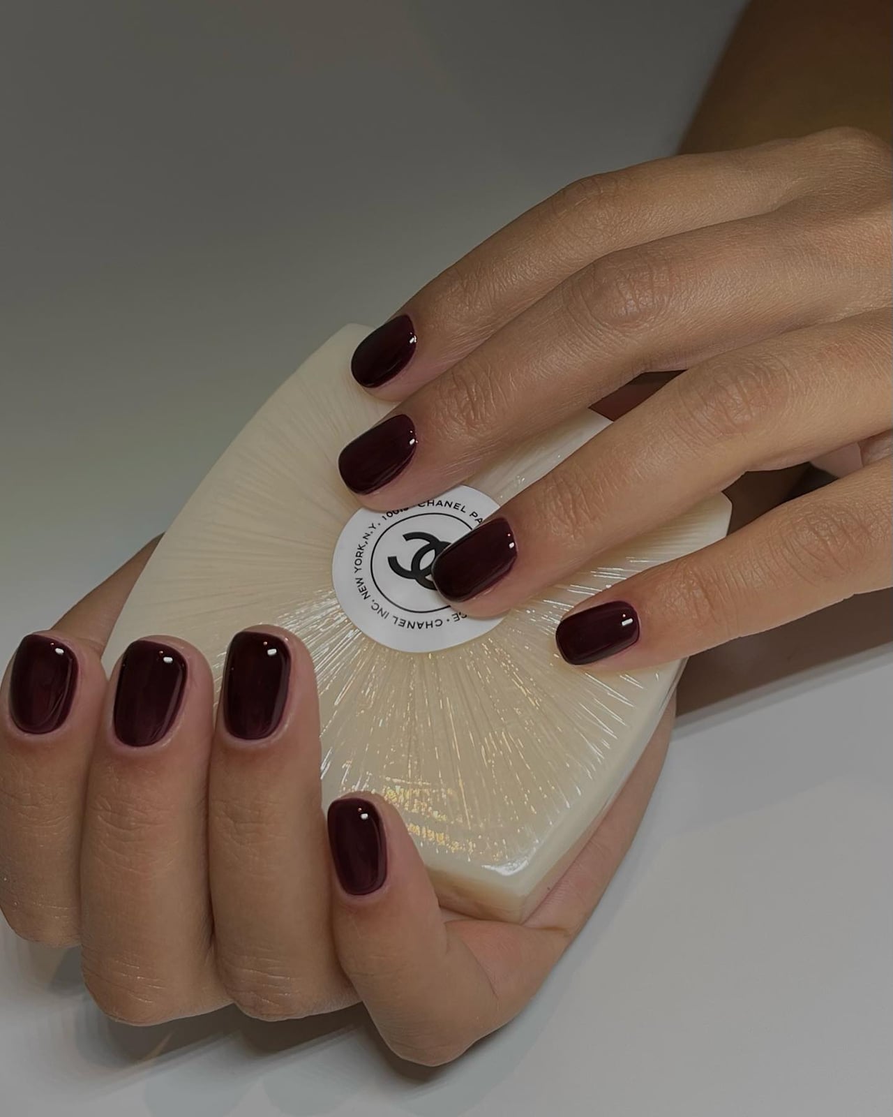 Deep Glossy Wine Red Short Oval Nails With Showing A Smooth Deep Glossy Wine Red Short Oval Nails With Showing A Smooth — Wine Nails