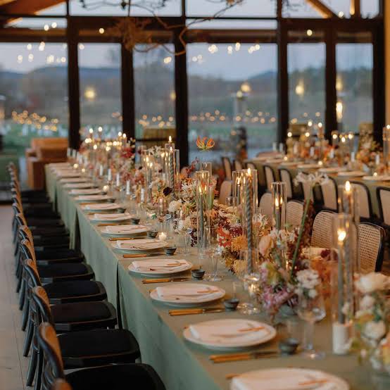 Elegant Modern Reception with Sage Green Linens and Tall Candles Elegant Modern Reception with Sage Green Linens and Tall Candles — Winter Wedding