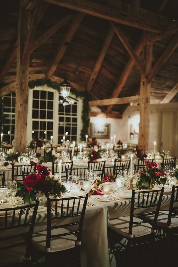 Rustic Elegant Reception Hall with Candlelit Banquet Tables Rustic Elegant Reception Hall with Candlelit Banquet Tables — Winter Wedding