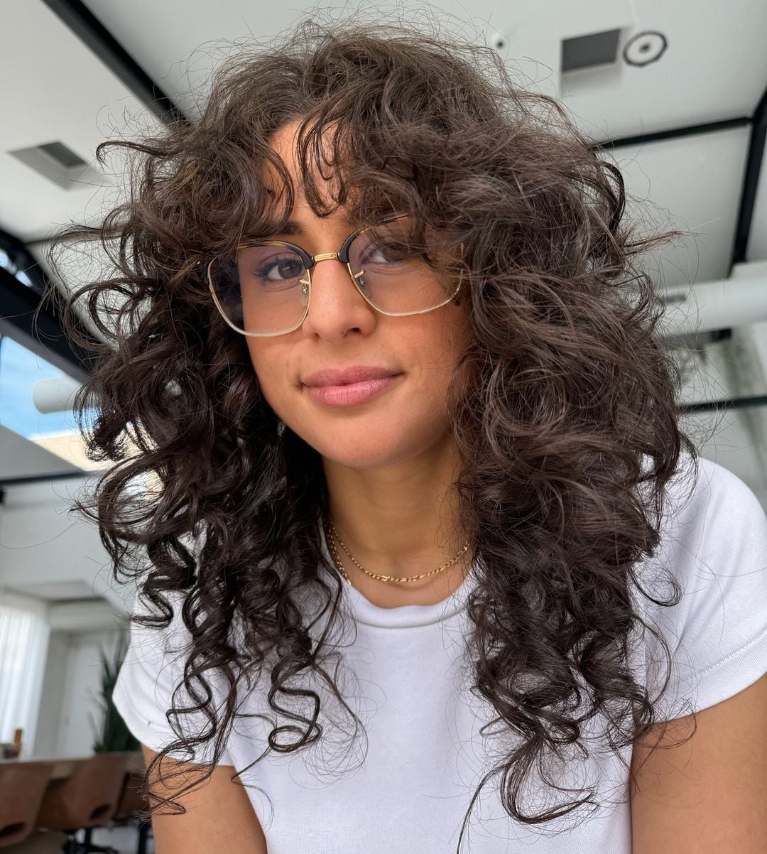 Voluminous Curls With Curtain Bangs Wolf Cut — Wolf Cut Curly Hair