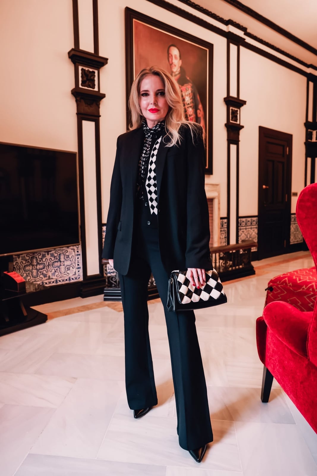 Black Tailored Suit with Checkered Scarf and Clutch — Work Party Outfits