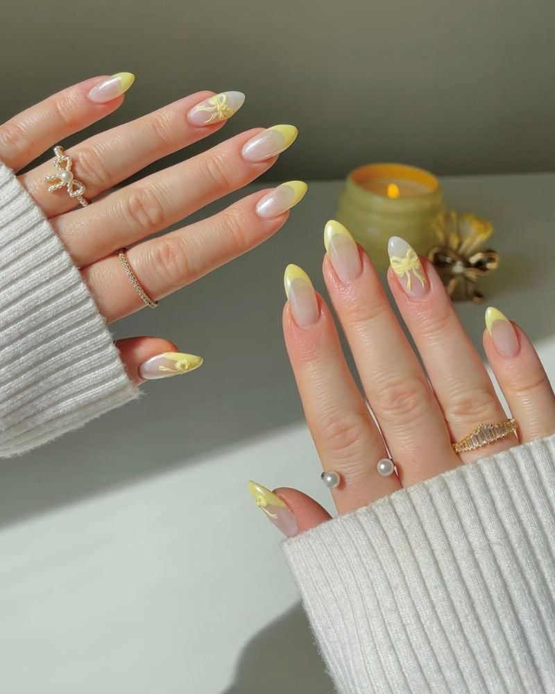 Medium Almond Pale Yellow French Tips With Bows — Yellow Nails